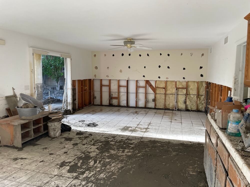 Technician performing water damage restoration in Brea CA